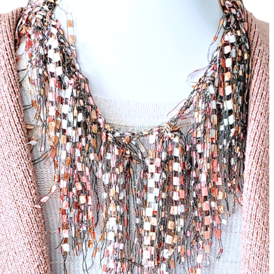 Close up of PInk, Rose and Tan color Statement Necklace Scarf showing details of metallic yarn materials 