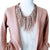 PInk, Rose and Tan color Statement Necklace Scarf worn on mannequin with blush pink color sweater