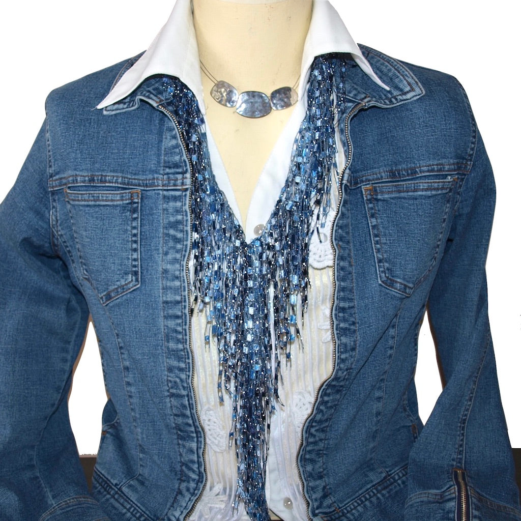 Denim blue color Scarf Necklace worn on a mannequin with a white blouse, denim jacket and a silver necklace